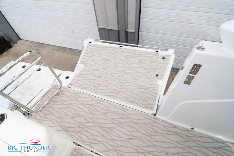 Slide: The Image of 2024 Jeanneau DB/37 OB boat deck with patterned flooring. - 22