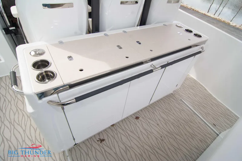 Slide: The Image of 2024 Jeanneau DB/37 OB boat interior with seating and storage. - 27