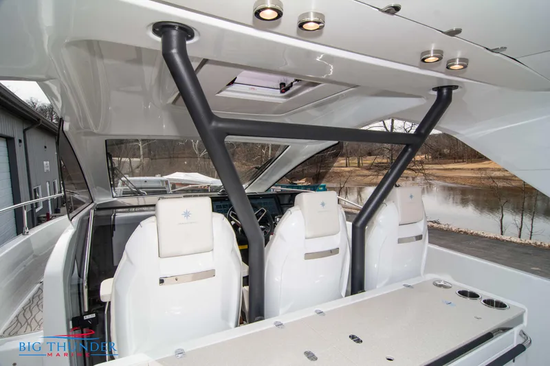 Slide: The Image of 2024 Jeanneau DB/37 OB boat interior with modern seating and sleek design. - 35