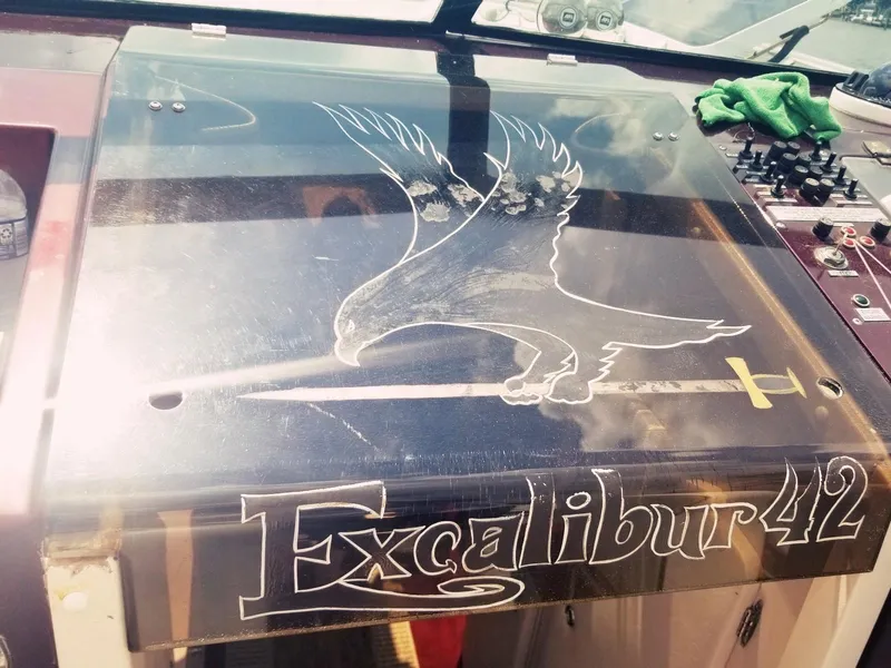 Slide: The Image of 1985 Wellcraft Excalibur Eagle 42 boat dashboard with eagle engraving. - 10