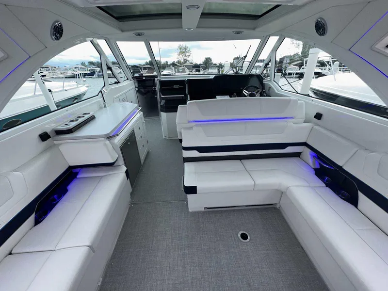 Slide: The Image of Luxurious interior of 2025 Formula 380 Super Sport Crossover OB boat with modern seating. - 13