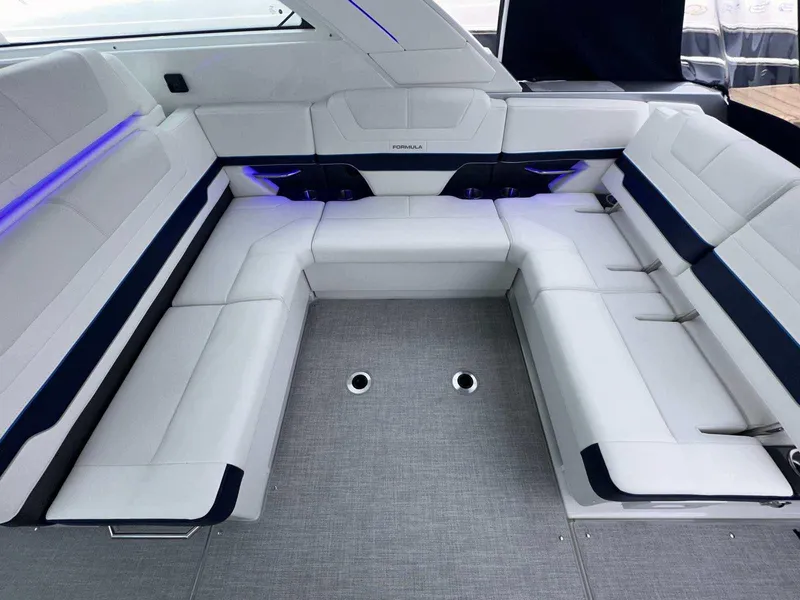 Slide: The Image of Luxurious seating area on 2025 Formula 380 Super Sport Crossover OB boat. - 16