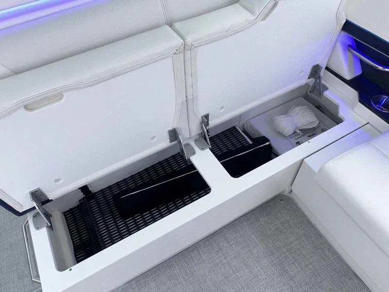 Slide: The Image of 2025 Formula 380 Super Sport Crossover OB boat storage compartments with open seating. - 17