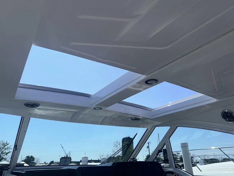 Slide: The Image of Interior view of 2025 Formula 380 Super Sport Crossover OB boat with skylights. - 44