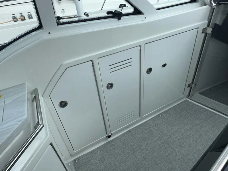Slide: The Image of 2025 Formula 380 Super Sport Crossover OB interior storage compartments. - 48