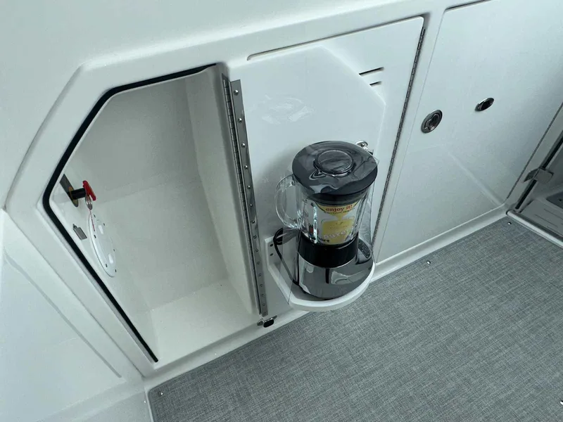 Slide: The Image of 2025 Formula 380 Super Sport Crossover OB with built-in blender in storage compartment. - 49