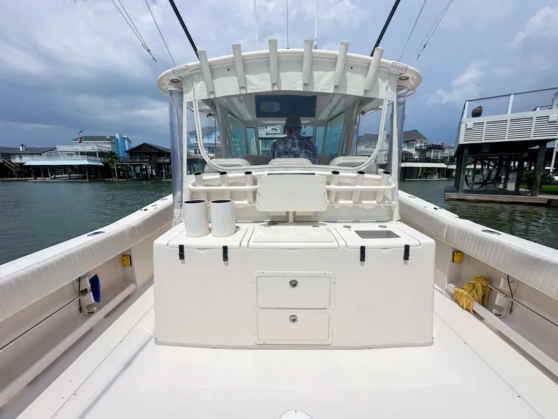 Slide: The Image of Grady-White 366 Canyon boat with 2020 Suzuki engines, docked, rear view, 2011 model. - 17