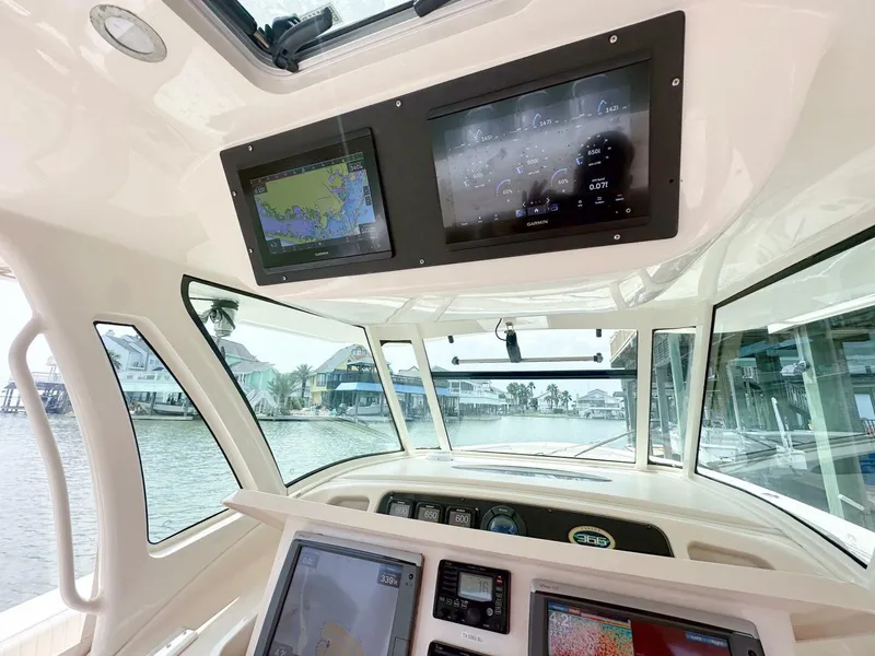 Slide: The Image of Grady-White 366 Canyon 2011 helm with 2020 Suzuki engines, advanced navigation displays. - 3