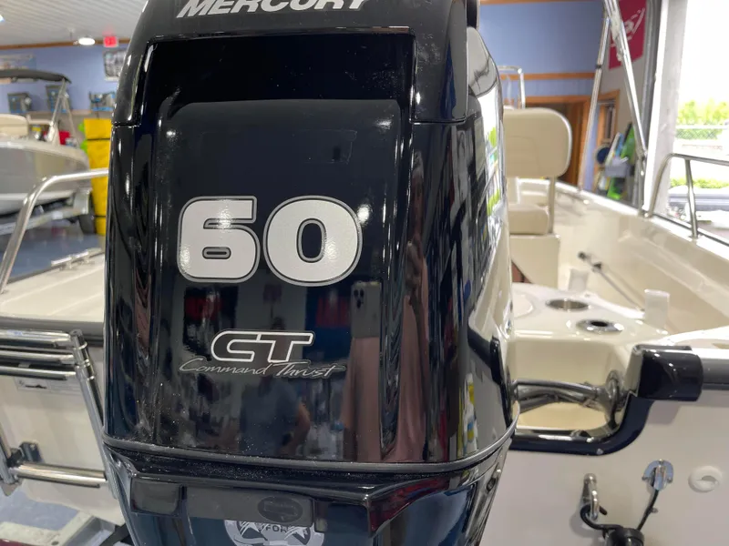 Slide: The Image of 2024 Boston Whaler 150 Montauk with Mercury 60 CT outboard motor. - 3