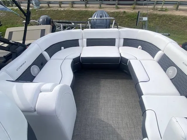 Slide: The Image of 2024 Barletta CORSA 23 QSSA boat interior with spacious seating and modern design. - 10