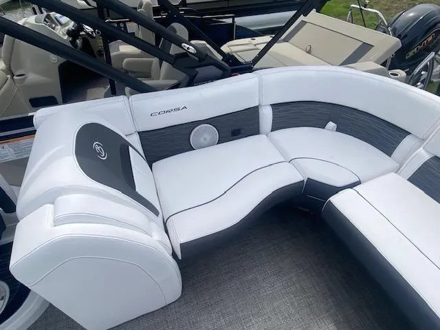 Slide: The Image of 2024 Barletta CORSA 23 QSSA boat interior with white and gray seating. - 12