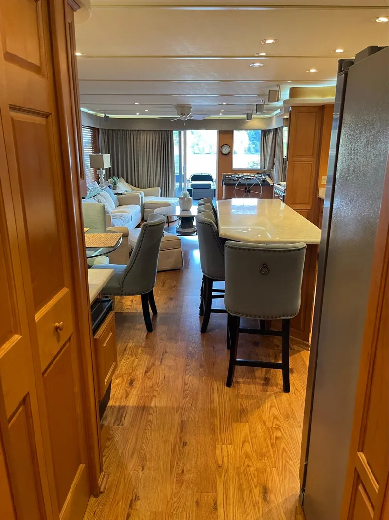 Slide: The Image of Interior of a 2003 Sharpe 75' Houseboat with modern kitchen and living area. - 15