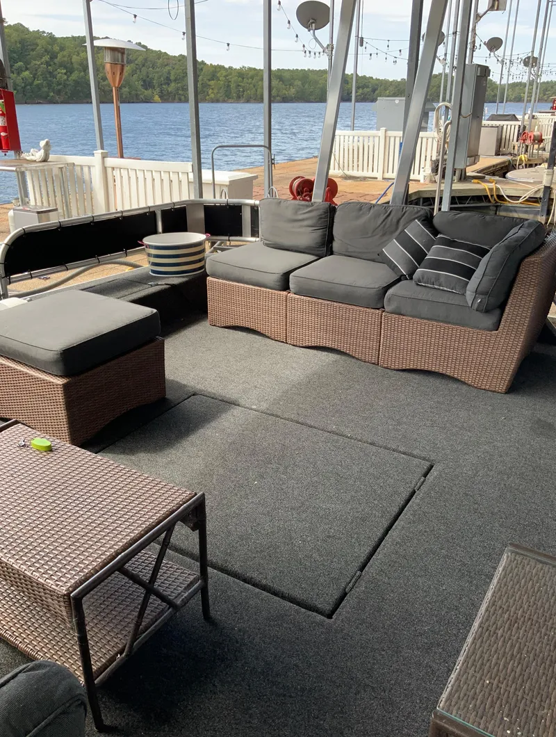 Slide: The Image of Outdoor seating area on a 2003 Sharpe 75' Houseboat with lake view. - 35