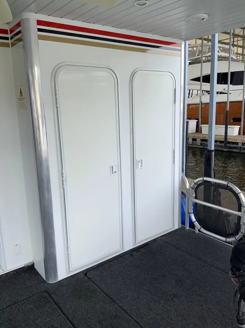 Slide: The Image of 2003 Sharpe 75' Houseboat double doors at dock - 47
