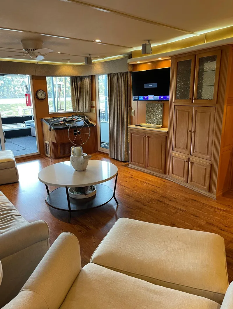 Slide: The Image of Luxurious interior of a 2003 Sharpe 75' Houseboat with modern amenities. - 7