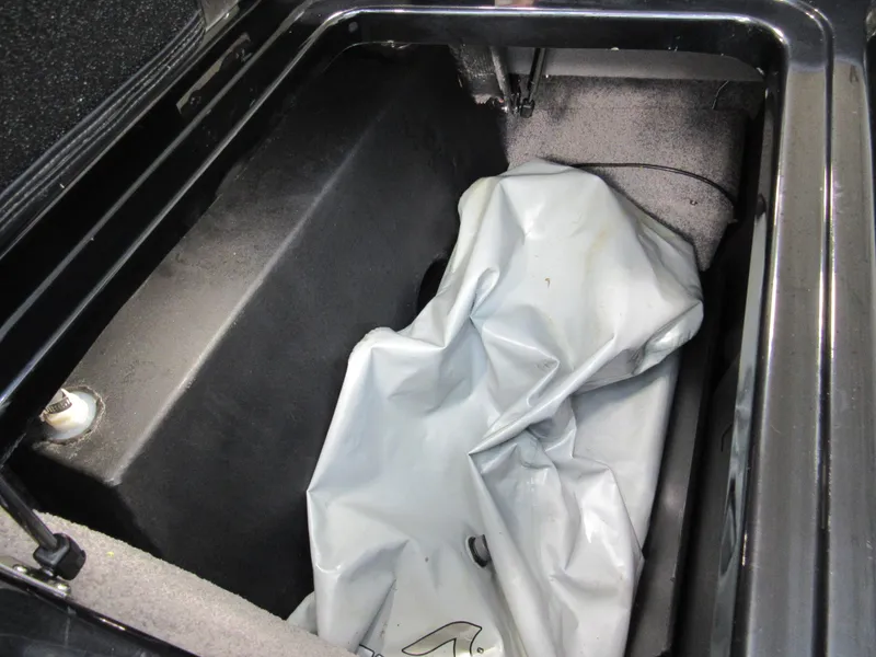 Slide: The Image of Storage compartment of a 2019 Malibu Wakesetter 24 MXZ boat. - 17