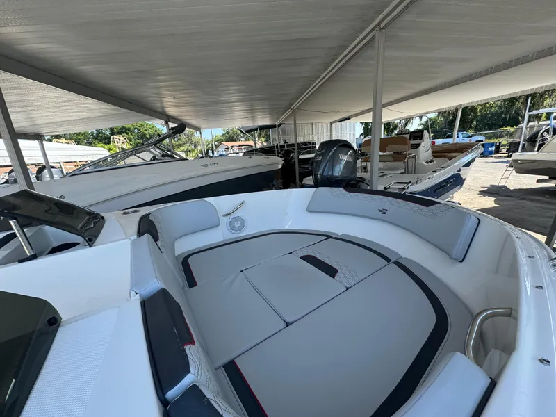 Slide: The Image of 2024 Bayliner Element M19 boat interior under canopy. - 6