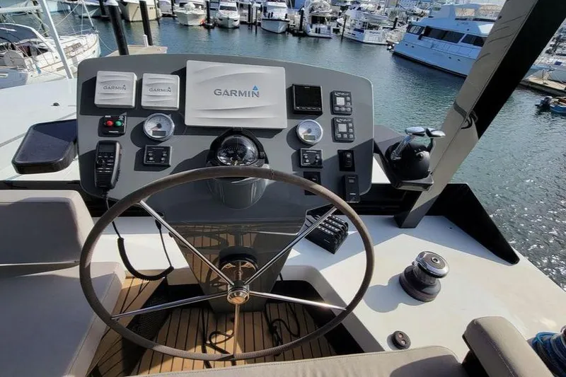 Slide: The Image of Control panel of 2022 Hussar WAVE 50 yacht with Garmin navigation system. - 2