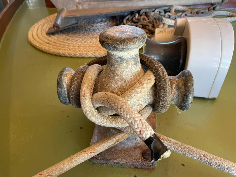 Slide: The Image of 1931 Jensen Cruiser mooring post with rope, showcasing vintage nautical equipment. - 42