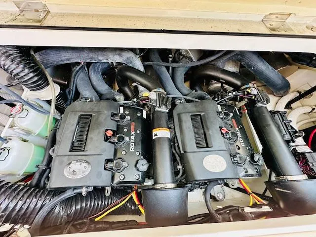 Slide: The Image of 2023 Scarab 255 Open ID engine compartment with dual Rotax engines. - 20