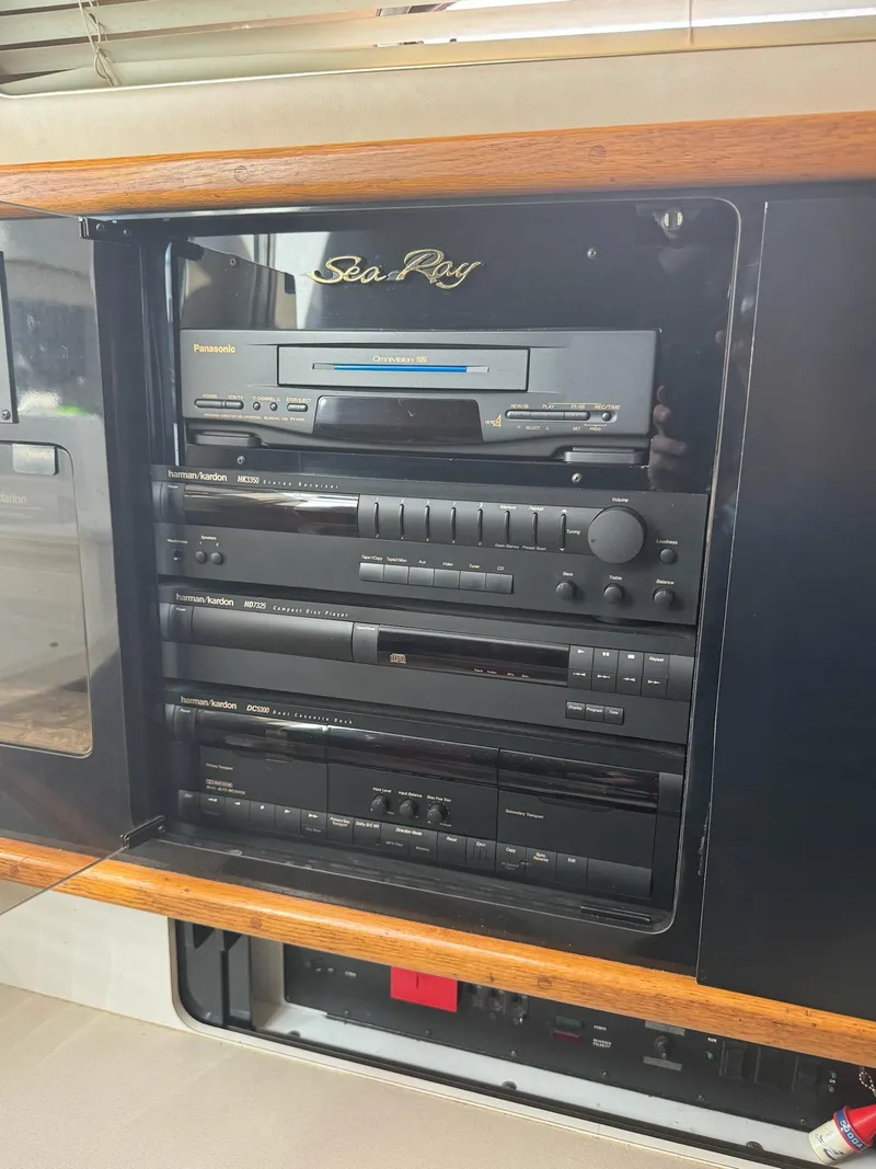 Slide: The Image of 1995 Sea Ray 500 audio system with Panasonic and Harman Kardon components. - 10