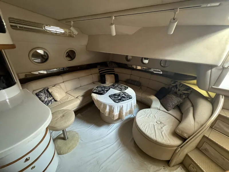 Slide: The Image of Luxurious 1995 Sea Ray 500 yacht interior with plush seating and elegant decor. - 15