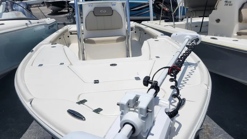 Slide: The Image of 2024 Key West 210 Bay Reef boat, front view with seating and trolling motor. - 4
