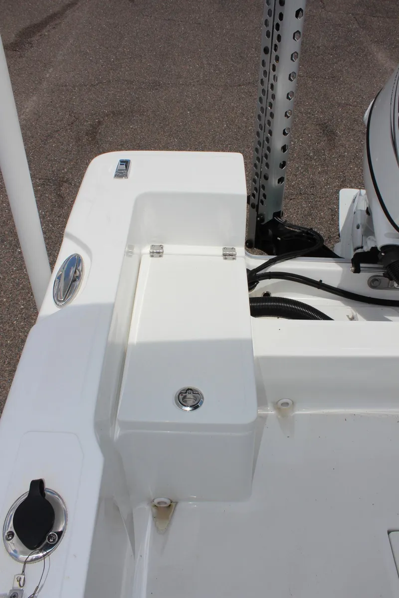 Slide: The Image of 2024 Clearwater 1900 boat stern with storage compartment and motor mount. - 11