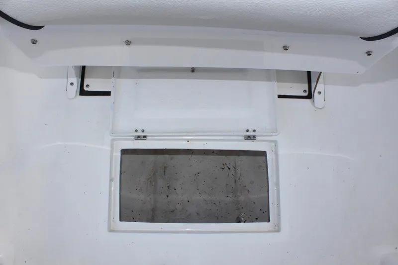 Slide: The Image of Clearwater 1900 boat storage compartment, 2024 model, open hatch view. - 13