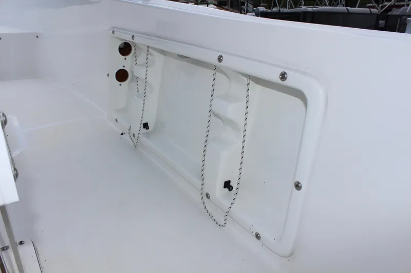 Slide: The Image of Clearwater 1900 boat interior, 2024 model, featuring storage compartment with chains. - 14