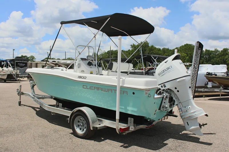 Slide: The Image of 2024 Clearwater 1900 boat with Suzuki outboard motor on trailer. - 8
