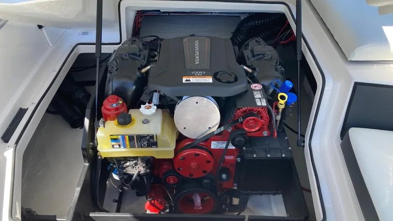 Slide: The Image of 2024 Regal 2000 ES boat engine compartment with Volvo Penta engine. - 7