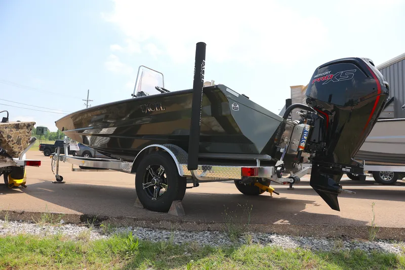 Slide: The Image of 2024 Excel 183 Bay Pro Elite boat on trailer with outboard motor. - 4