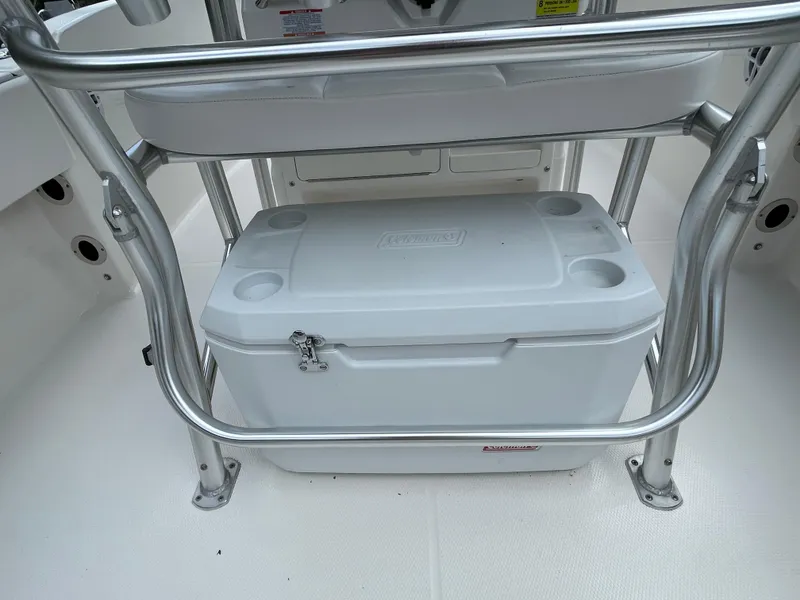 Slide: The Image of 2021 Robalo R180 Center Console with cooler storage under seat. - 22
