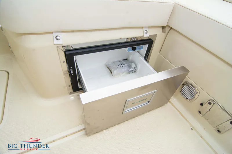 Slide: The Image of Built-in refrigerator drawer on the 2024 Capoforte CX280i boat. - 18