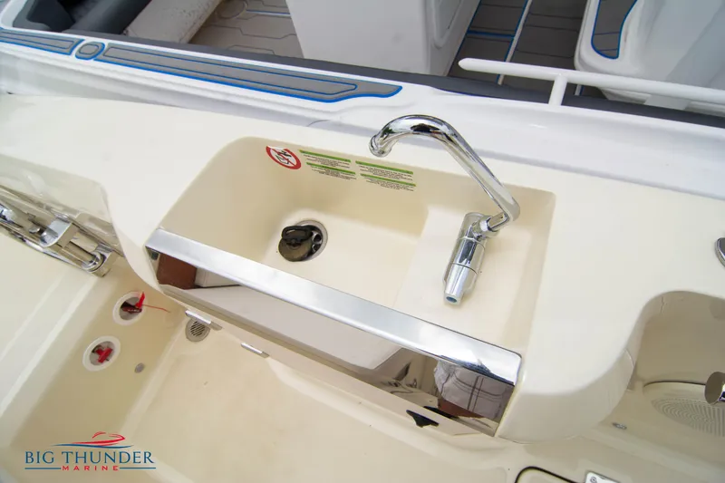 Slide: The Image of Capoforte CX280i 2024 boat sink and faucet in the cockpit area. - 19