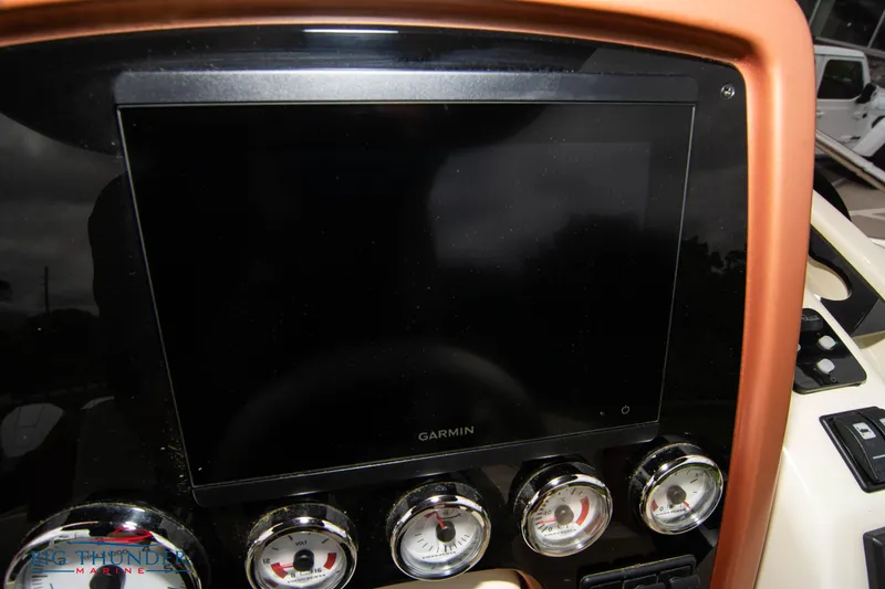 Slide: The Image of Dashboard of 2024 Capoforte CX280i with Garmin display and gauges. - 27