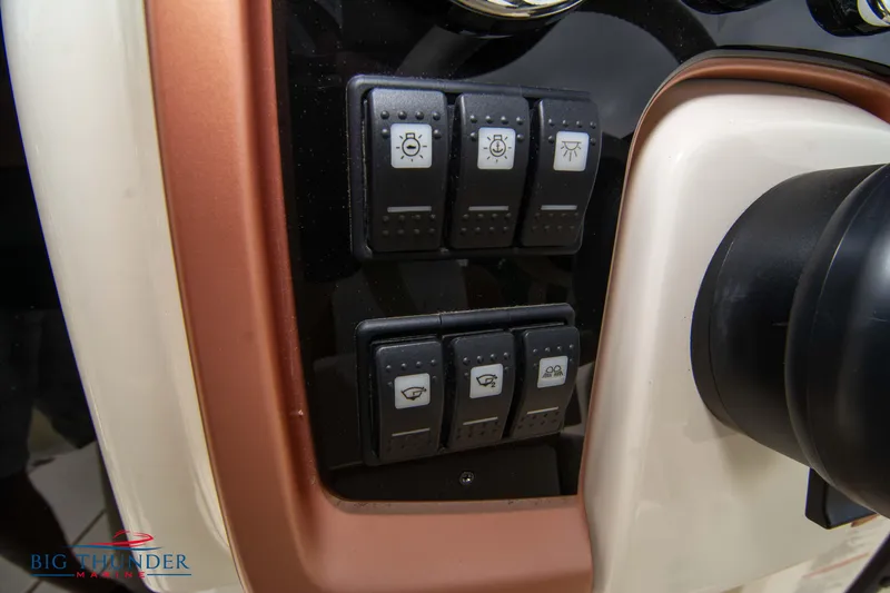 Slide: The Image of Control panel of 2024 Capoforte CX280i boat with various switches. - 30