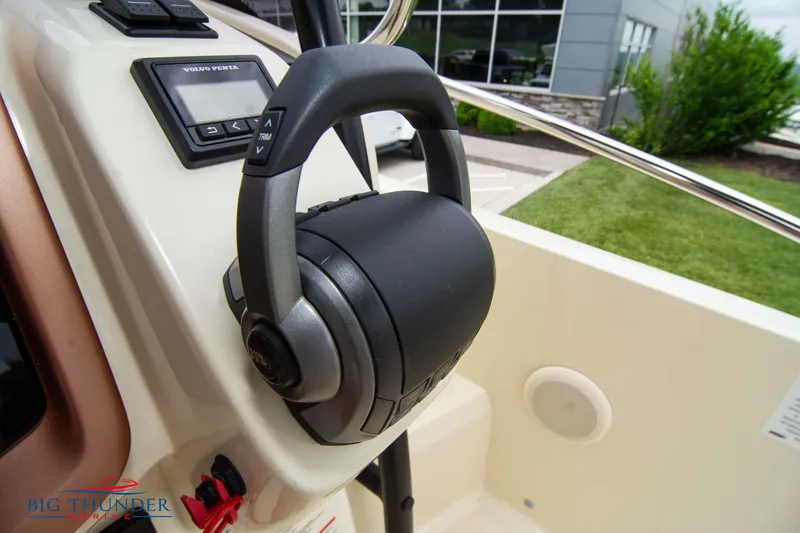Slide: The Image of Close-up of the 2024 Capoforte CX280i boat throttle control. - 35
