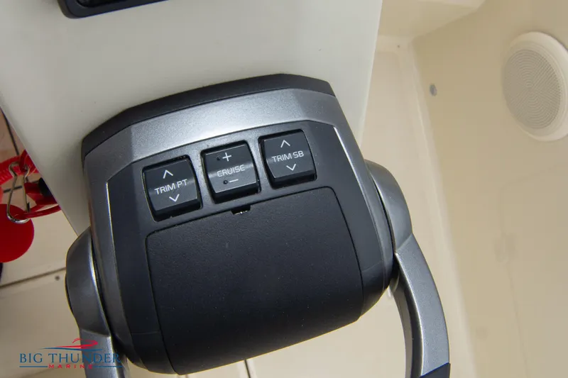 Slide: The Image of Close-up of 2024 Capoforte CX280i boat throttle control panel. - 37