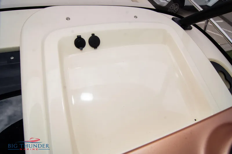 Slide: The Image of Capoforte CX280i 2024 boat storage compartment with dual power outlets. - 40