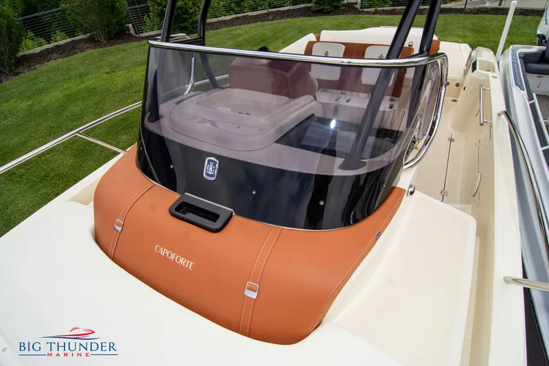 Slide: The Image of 2024 Capoforte CX280i boat with sleek design and modern features, showcased by Big Thunder Marine. - 49