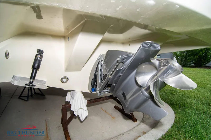 Slide: The Image of Close-up of the 2024 Capoforte CX280i boat's propeller and stern drive system. - 6