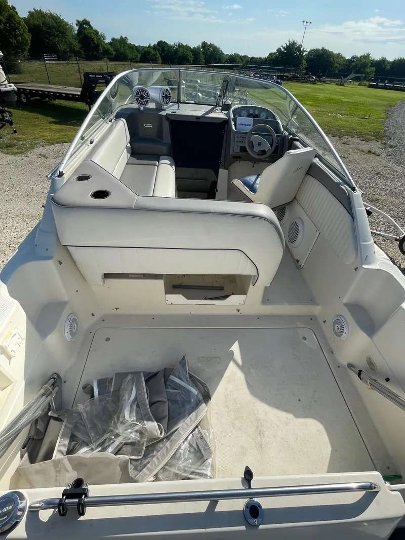 Slide: The Image of 1994 Bayliner 2655 Ciera boat interior with seating and steering wheel. - 5