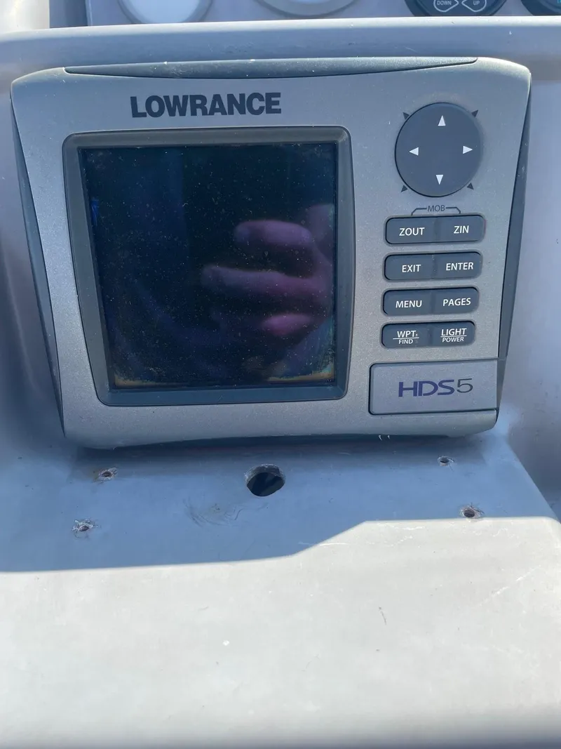 Slide: The Image of Lowrance HDS-5 fishfinder on 1994 Bayliner 2655 Ciera boat dashboard. - 7