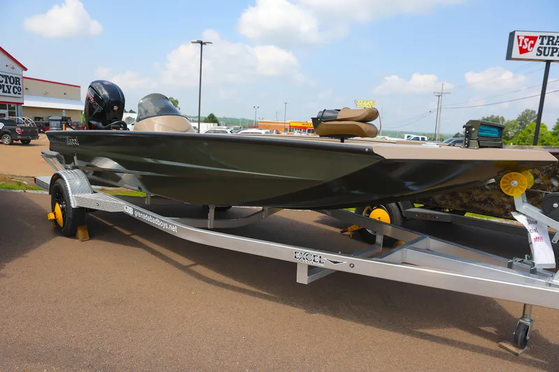 Slide: The Image of 2024 Excel 1860 Stalker SC boat on trailer in parking lot. - 7