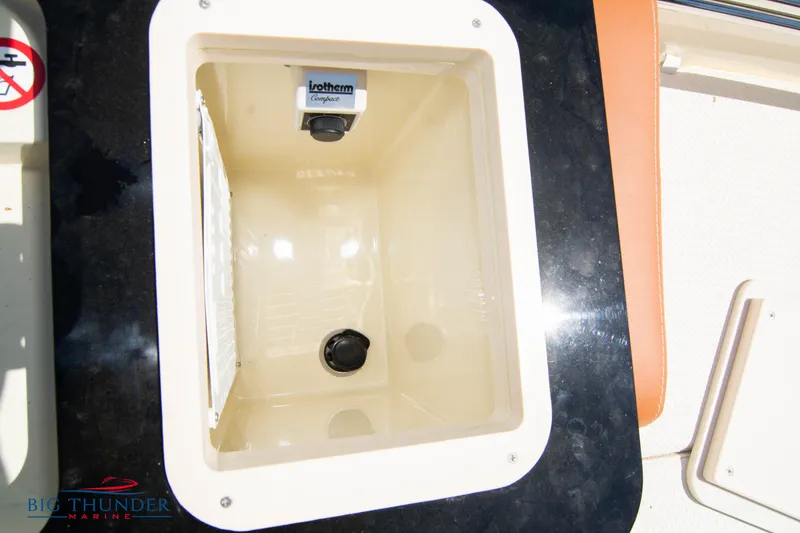 Slide: The Image of Capoforte SX200 2024 model boat storage compartment with Rotomolded cooler. - 27
