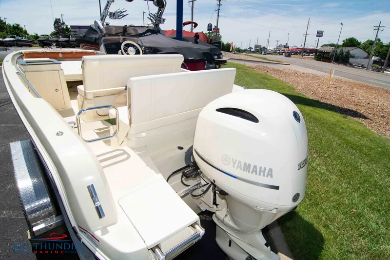 Slide: The Image of 2024 Capoforte SX200 boat with Yamaha outboard motor, displayed outdoors on a sunny day. - 5