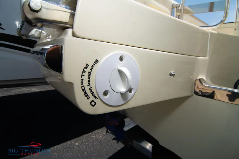 Slide: The Image of 2024 Capoforte SX200 boat stern with fuel cap and Big Thunder Marine logo. - 6