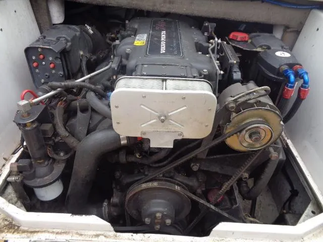 Slide: The Image of 1996 Four Winns 240 Horizon boat engine compartment. - 26